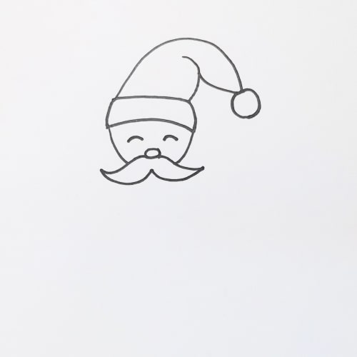 Making his Face in 'Santa Claus Drawing'