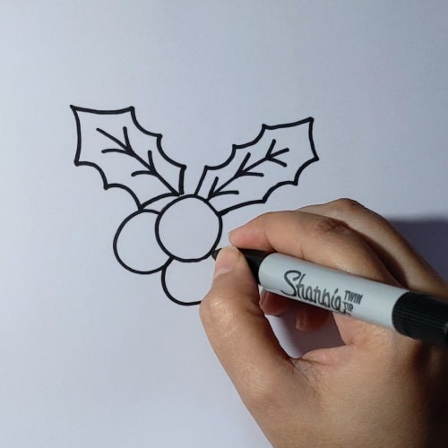 step 3 is where we add more berries to "holly leaves drawing"